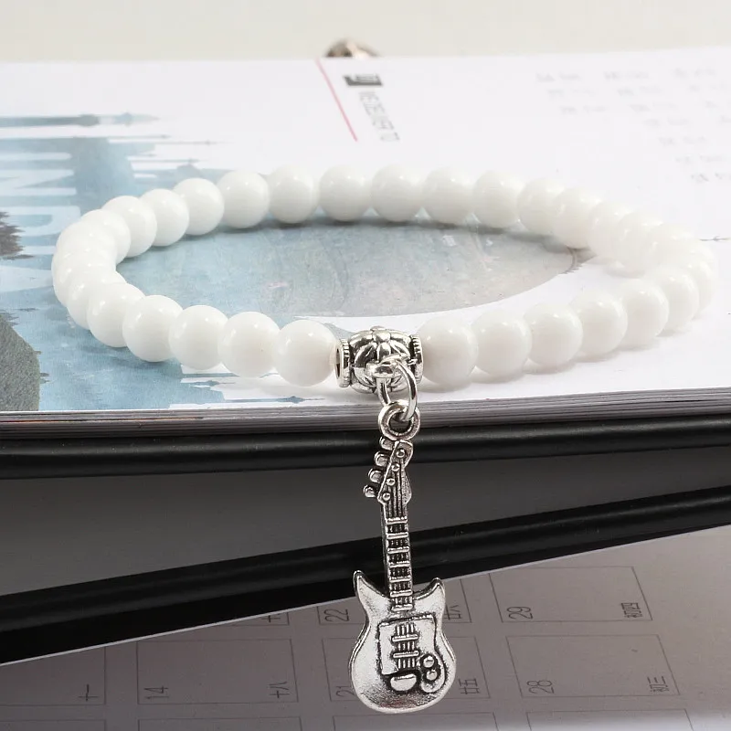 Fashion Natural Turquoises Men Alloy Guitar Violin Pendant Bracelet Charm Yoga Bangle Distance Couple Black Matte Beads Jewelry
Fashion Natural Turquoises Men Alloy Guitar Violin Pendant Bracelet Charm Yoga Bangle Distance Couple Black Matte Beads Jewelry