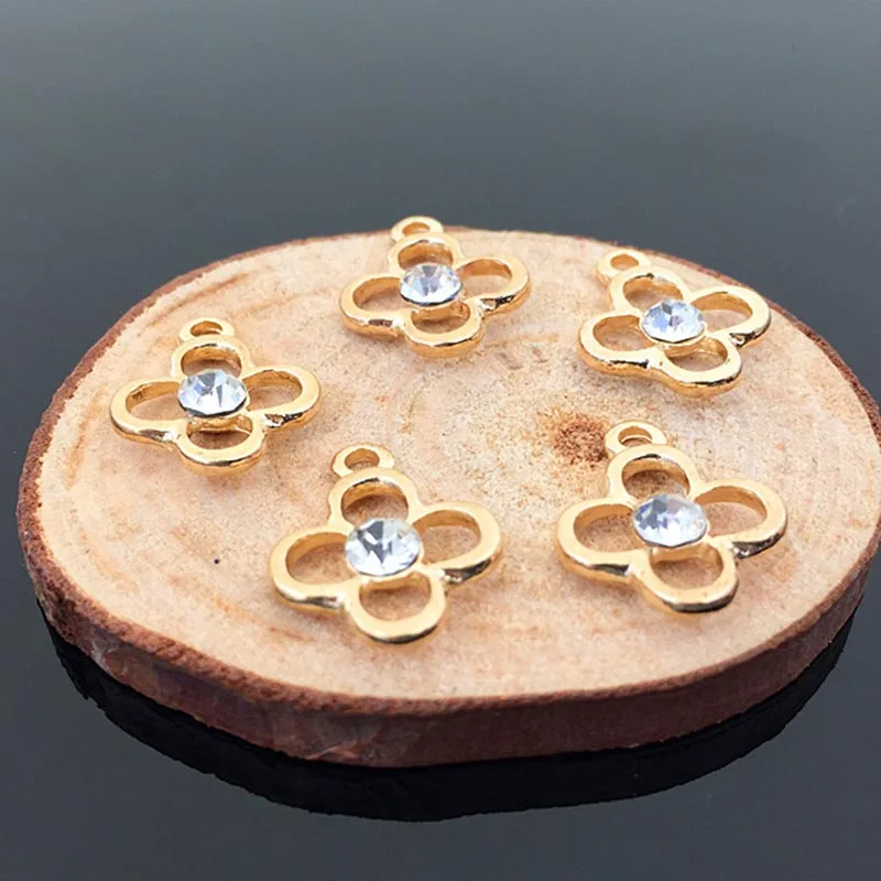2016New 50Pcs Gold Flower Rhinestone Center Buttons/Buckle or DIY Pendant for DIY Hair accessories HZ50
2016New 50Pcs Gold Flower Rhinestone Center Buttons/Buckle or DIY Pendant for DIY Hair accessories HZ50