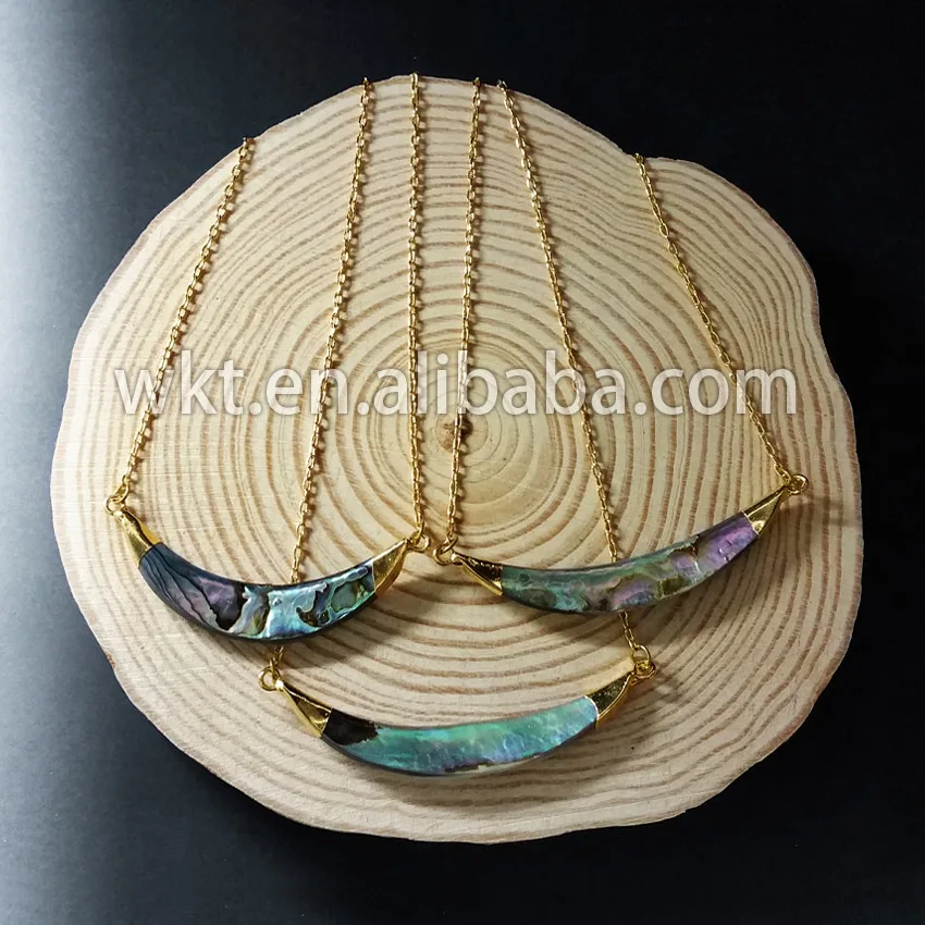 WKT Elegant fashion gold shell horn necklace double bails natural abalone horn necklace in free shopping
WKT Elegant fashion gold shell horn necklace double bails natural abalone horn necklace in free shopping