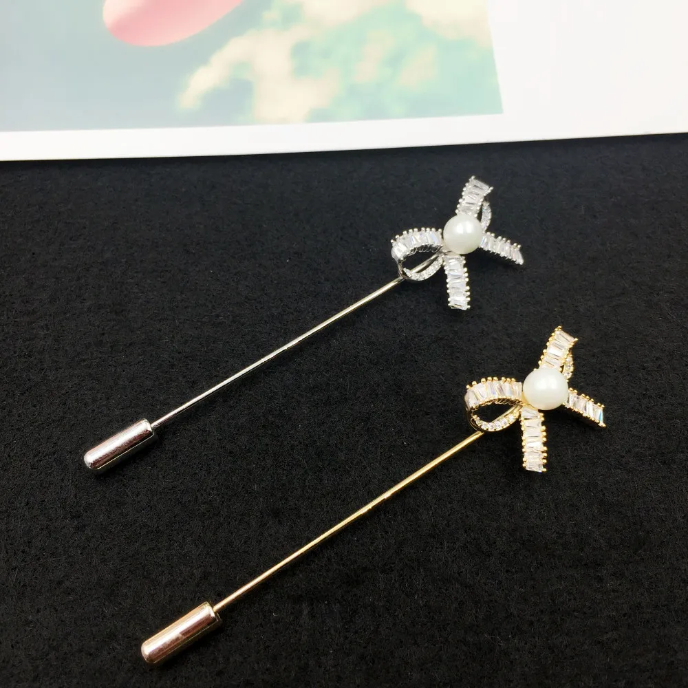 New Trendy Zircon Bowknot Brooches for Women Men Fashion Simulated Pearl Brooch Scarf Collar Pins Suit Dress Jewelry Accessories
New Trendy Zircon Bowknot Brooches for Women Men Fashion Simulated Pearl Brooch Scarf Collar Pins Suit Dress Jewelry Accessories