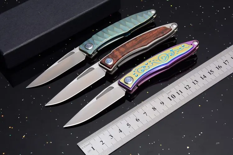High-end M390 blade KVT pedal titanium alloy indented wooden handle 3 color camping bag sharp defense knife EDC free shipping
High-end M390 blade KVT pedal titanium alloy indented wooden handle 3 color camping bag sharp defense knife EDC free shipping