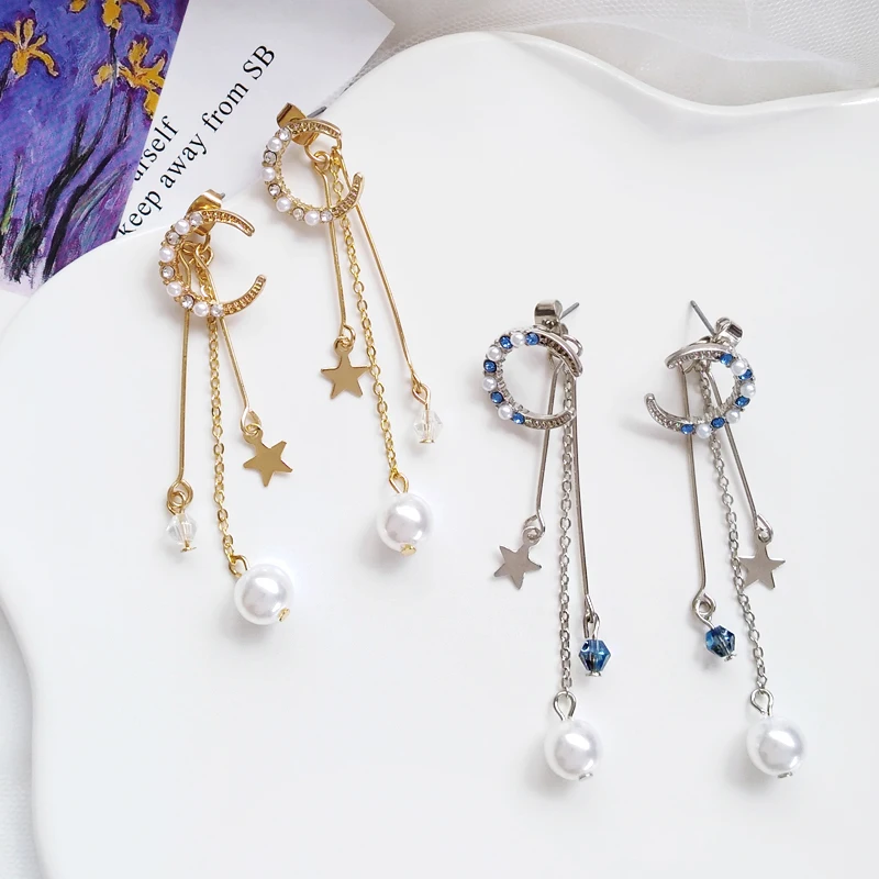 Creative wild metal texture long chain moon shape five-pointed star pearl earrings Wholesale
Creative wild metal texture long chain moon shape five-pointed star pearl earrings Wholesale