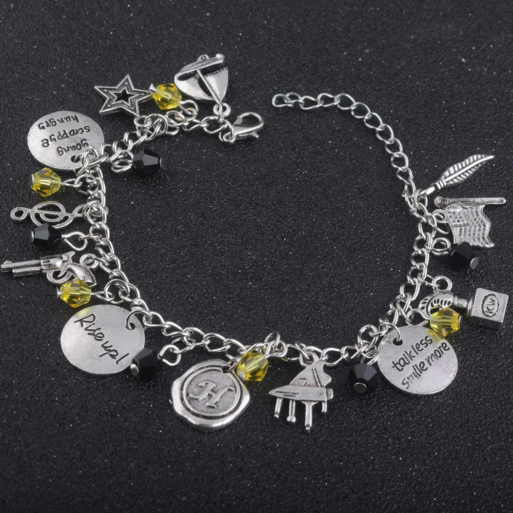 Hamilton Broadway Musical "Rise up""Talk Less,Smile More" bracelet with gun,shar,music symbol,leaf ,lyrics Hand Stamped Bangle
Hamilton Broadway Musical "Rise up""Talk Less,Smile More" bracelet with gun,shar,music symbol,leaf ,lyrics Hand Stamped Bangle