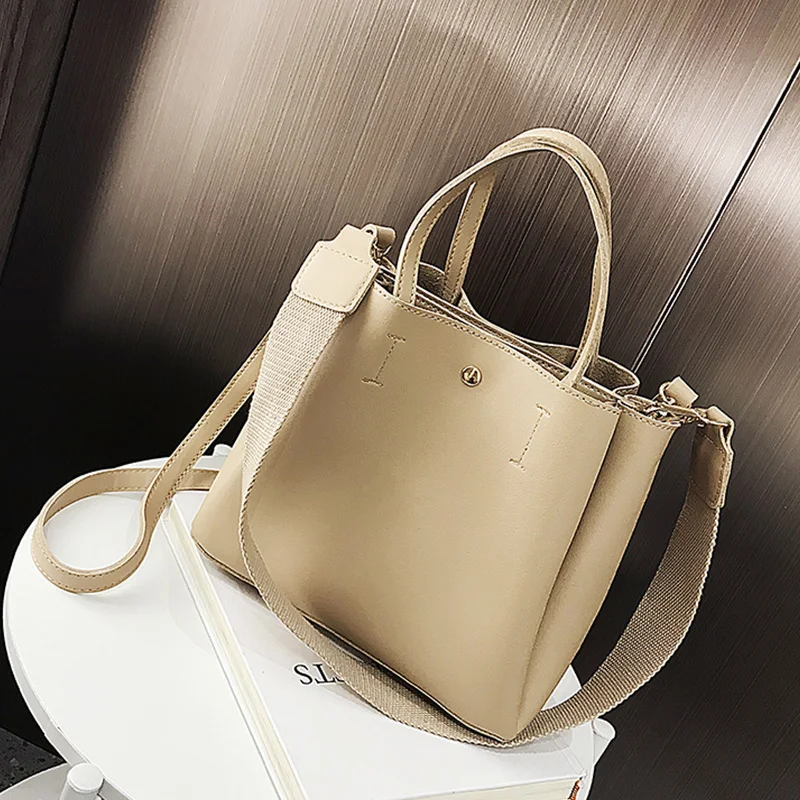 Commuter handbag 2019 new fashion tide wild portable bucket bag solid color casual large capacity shoulder Messenger bag
Commuter handbag 2019 new fashion tide wild portable bucket bag solid color casual large capacity shoulder Messenger bag