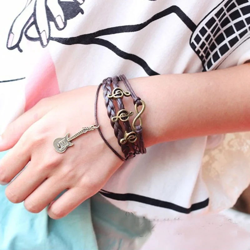 1Pc New High Quality Bracelets Infinity Guitar Music Note Shape Friendship Antique Leather Charm Fashion Party Jewelry Gift
1Pc New High Quality Bracelets Infinity Guitar Music Note Shape Friendship Antique Leather Charm Fashion Party Jewelry Gift