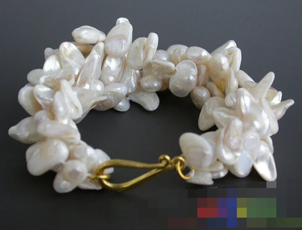 FREE SHIPPING>>>@@ > 01385 4row 8" white tail wine Freshwater cultured pearl BRACELET
FREE SHIPPING>>>@@ > 01385 4row 8" white tail wine Freshwater cultured pearl BRACELET
