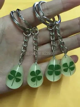 Free Shipping 12 pcs Hot sale real shamrock summer green four leaf clover glow in dark drop keychain
Free Shipping 12 pcs Hot sale real shamrock summer green four leaf clover glow in dark drop keychain