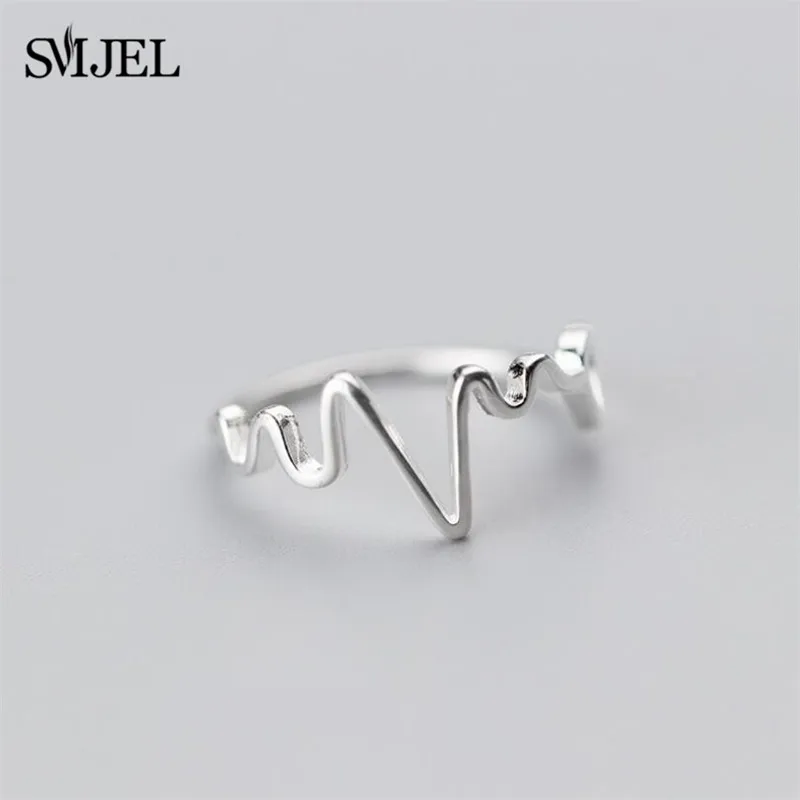 SMJEL Love Wave Heart Rings Fashion 100% 925 Sterling Silver Ecg Heartbeat Rings For Women anillos Mujer 2019
SMJEL Love Wave Heart Rings Fashion 100% 925 Sterling Silver Ecg Heartbeat Rings For Women anillos Mujer 2019