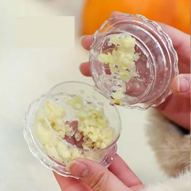 BF040 Multi-function Transparent round twisting the garlic Press the garlic 8*4cm free shipping
BF040 Multi-function Transparent round twisting the garlic Press the garlic 8*4cm free shipping