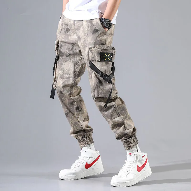 Men street punk hip hop camouflage tactical cargo pants multi pockets ribbon patchwork sweatpants man casual harem joggers
Men street punk hip hop camouflage tactical cargo pants multi pockets ribbon patchwork sweatpants man casual harem joggers