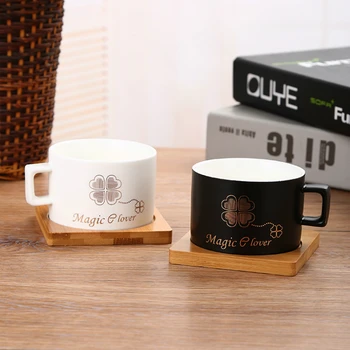 2 Pcs Magic Four Leaf Clover Trace Gold Coffee Mug With Tray Set Cafe Friends Lover Pair Espresso Cup Bamboo Hoder Koffie Kopjes
2 Pcs Magic Four Leaf Clover Trace Gold Coffee Mug With Tray Set Cafe Friends Lover Pair Espresso Cup Bamboo Hoder Koffie Kopjes