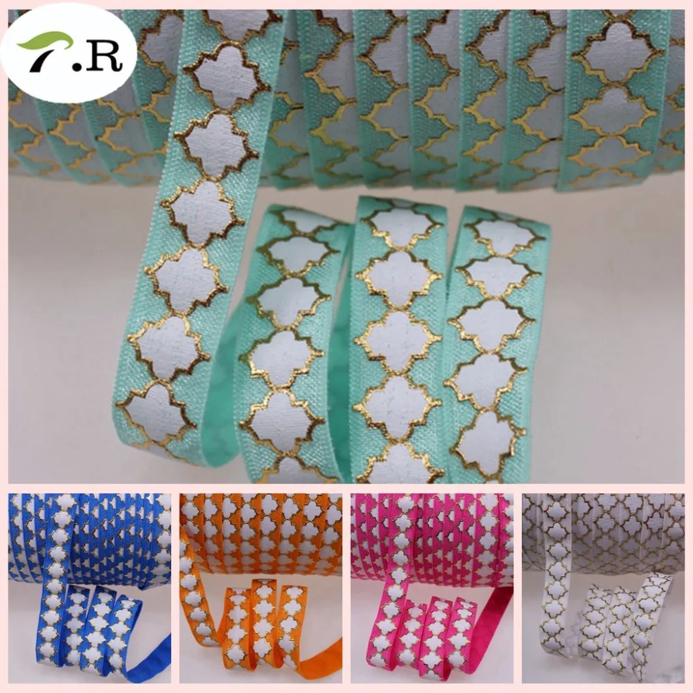 6 colors 5/8" gold foil + white ink quatrefoil fold over elastic for boutique ties 50yards/lot
6 colors 5/8" gold foil + white ink quatrefoil fold over elastic for boutique ties 50yards/lot