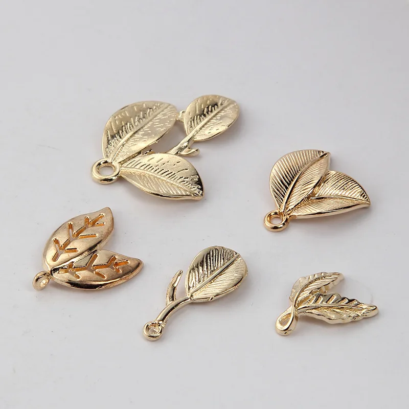 100pcs High quality DIY Leaf Gold Color Alloy pendant Leaves Charms Metal Bracelet Charm Bride Jewelry accessories
100pcs High quality DIY Leaf Gold Color Alloy pendant Leaves Charms Metal Bracelet Charm Bride Jewelry accessories