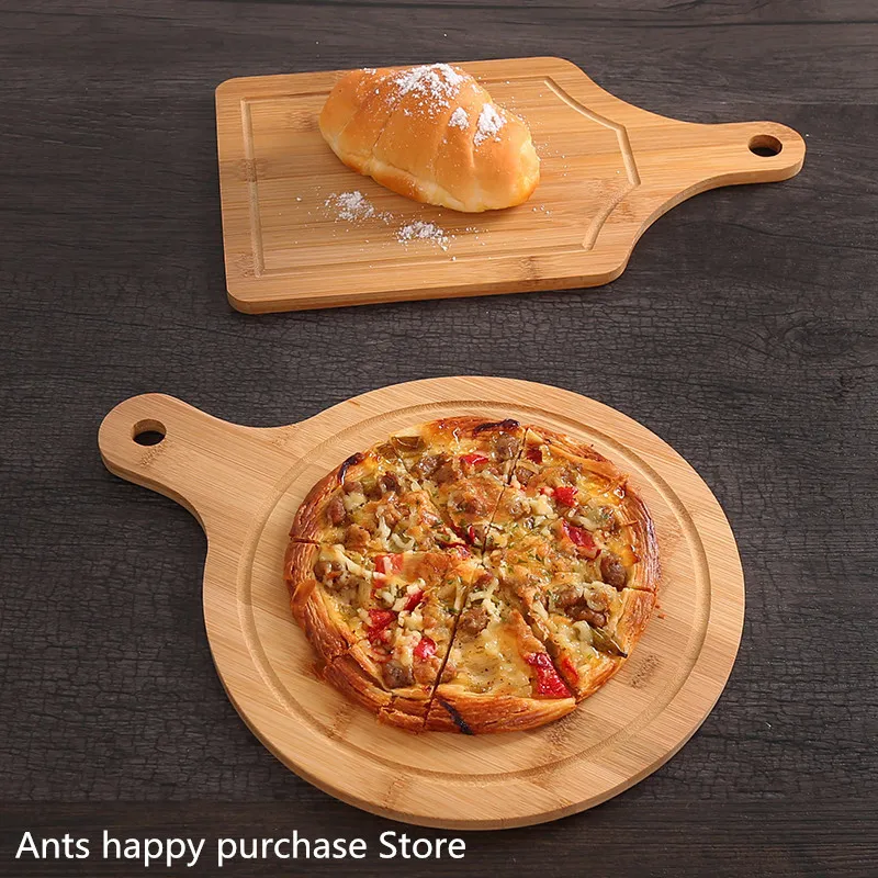 Natural paint-free round Pizza plate Cut bread dessert steak chopping board Japanese dishes Western dishes Pizza Tray Bamboo
Natural paint-free round Pizza plate Cut bread dessert steak chopping board Japanese dishes Western dishes Pizza Tray Bamboo
