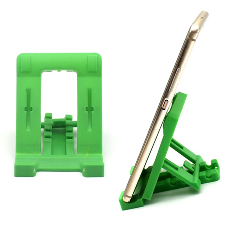2018 Universal Folding Table cell phone support Plastic holder desktop stand your phone Smartphone Phone holder For iphone X 6 7
2018 Universal Folding Table cell phone support Plastic holder desktop stand your phone Smartphone Phone holder For iphone X 6 7