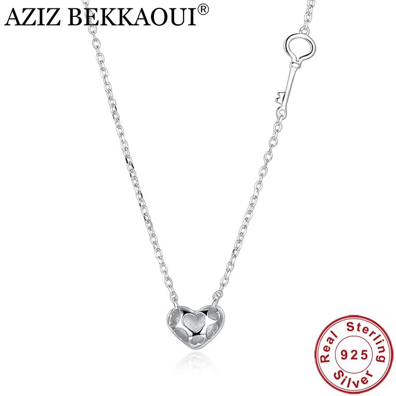 AZIZ BEKKAOUI 925 Sterling Silver Unique Heart & Key Clear CZ Pendant Necklaces Silver Necklace for Women Fine Jewelry
AZIZ BEKKAOUI 925 Sterling Silver Unique Heart & Key Clear CZ Pendant Necklaces Silver Necklace for Women Fine Jewelry