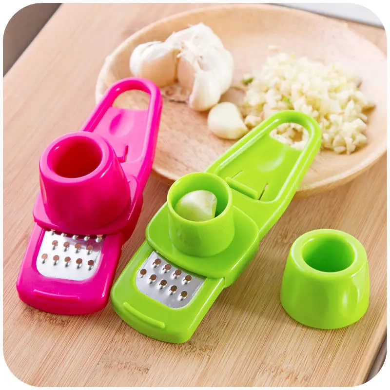 1pcs Kitchen Gadget Kitchen Accessories Creative Multi-functional Garlic Grinder Garlic Cutter Magic Peeler Slicer Grater Planer
1pcs Kitchen Gadget Kitchen Accessories Creative Multi-functional Garlic Grinder Garlic Cutter Magic Peeler Slicer Grater Planer