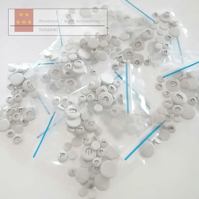 Deluxe Quality White Color Leather Clarinet Pads Woodwind instrument repair parts
Deluxe Quality White Color Leather Clarinet Pads Woodwind instrument repair parts