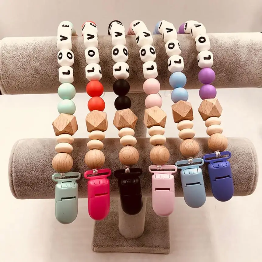 Baby Clothes Unisex Baby Wood Beaded Pacifier Clip Chain Nipple Holder Solid Infant Soother Teether Free from Chemicals 2018
Baby Clothes Unisex Baby Wood Beaded Pacifier Clip Chain Nipple Holder Solid Infant Soother Teether Free from Chemicals 2018