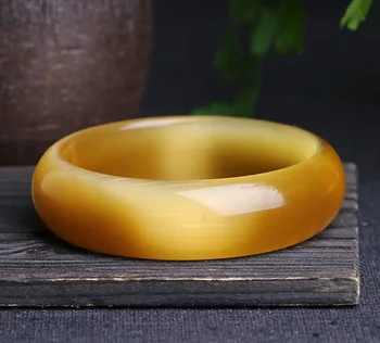 Genuine Bright Yellow ColorNatural Cat Eye Stone Bangle Bracelet Fine Opal Bangle Jewelry Lucky Gift For Woman Can Drop Shipping
Genuine Bright Yellow ColorNatural Cat Eye Stone Bangle Bracelet Fine Opal Bangle Jewelry Lucky Gift For Woman Can Drop Shipping