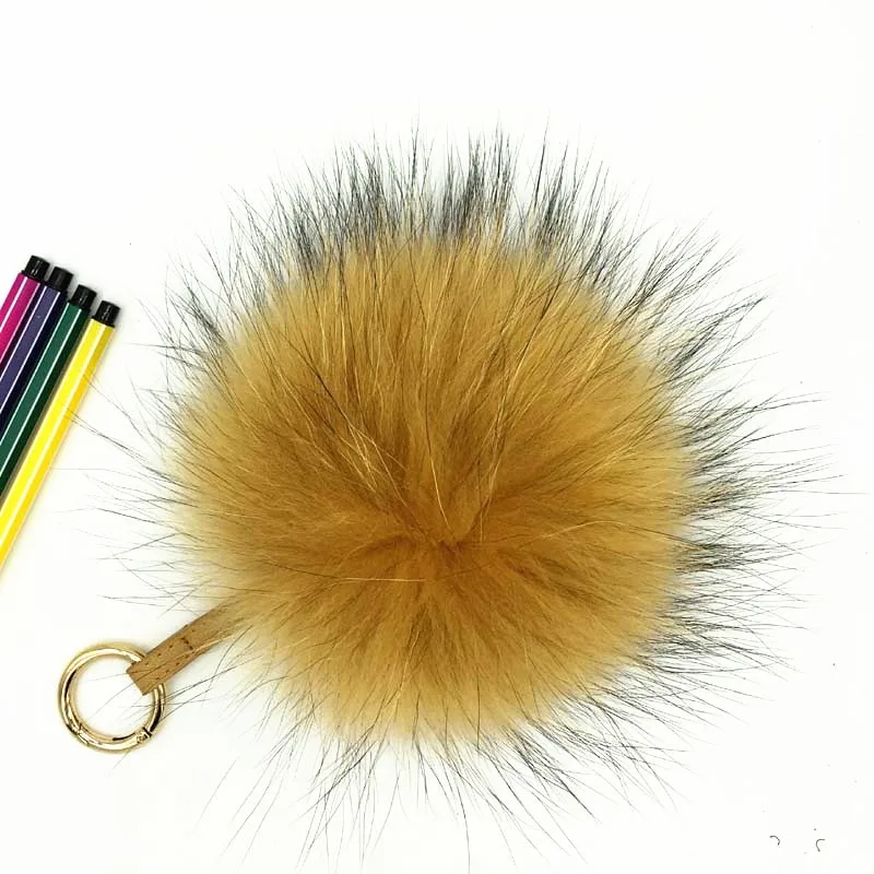 raccoon fur pompom gold 1