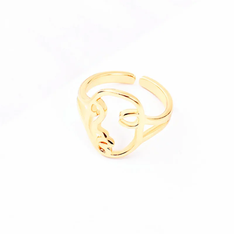 Fashion contracted face contour design abstract smiling face geometry fun creative ring female shape
Fashion contracted face contour design abstract smiling face geometry fun creative ring female shape