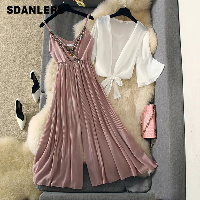 2019 New Summer Bohemian Style Suit Women Bead Tassel Sling Chiffon Jumpsuit +thin Shawl Cardigan Coat Girls Students Beach Set
2019 New Summer Bohemian Style Suit Women Bead Tassel Sling Chiffon Jumpsuit +thin Shawl Cardigan Coat Girls Students Beach Set