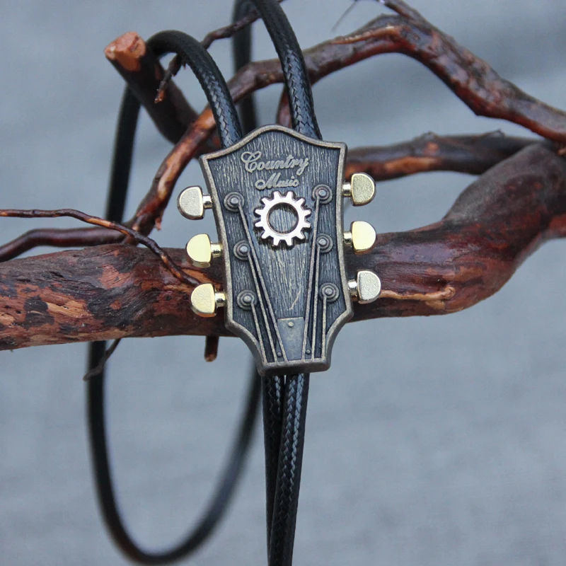 Original designer alloy guitar bolo tie for men personality neck tie fashion accessory
Original designer alloy guitar bolo tie for men personality neck tie fashion accessory