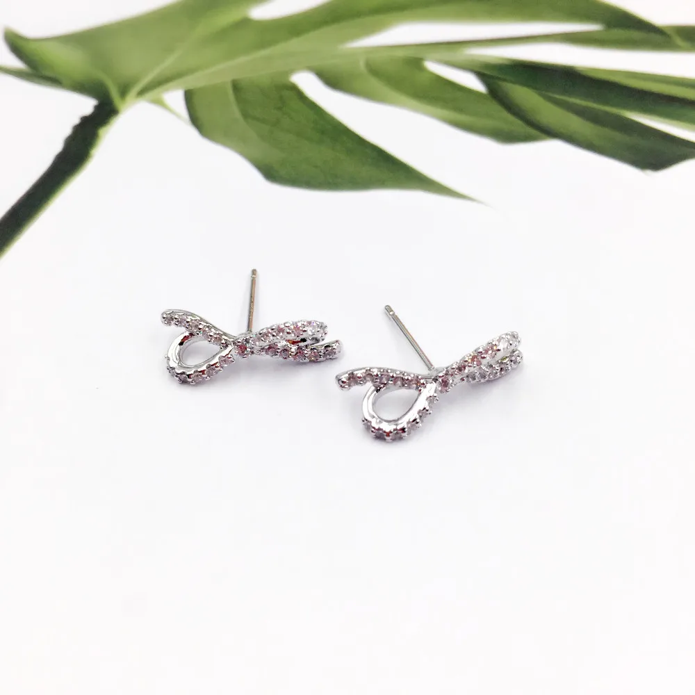 925 Sterling Silver Needle Sparkling Bow Stud Earrings with CZ for Women Girls Fashion Romantic Earring Jewelry Gift
925 Sterling Silver Needle Sparkling Bow Stud Earrings with CZ for Women Girls Fashion Romantic Earring Jewelry Gift