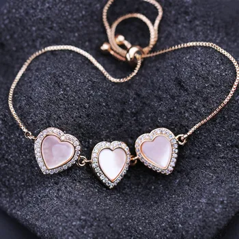 Newranos Shell Pearl Bracelet Champagne Gold Heart Shape Adjustable Link Chain Bracelet for Women Fashion Jewelry BWX003842
Newranos Shell Pearl Bracelet Champagne Gold Heart Shape Adjustable Link Chain Bracelet for Women Fashion Jewelry BWX003842