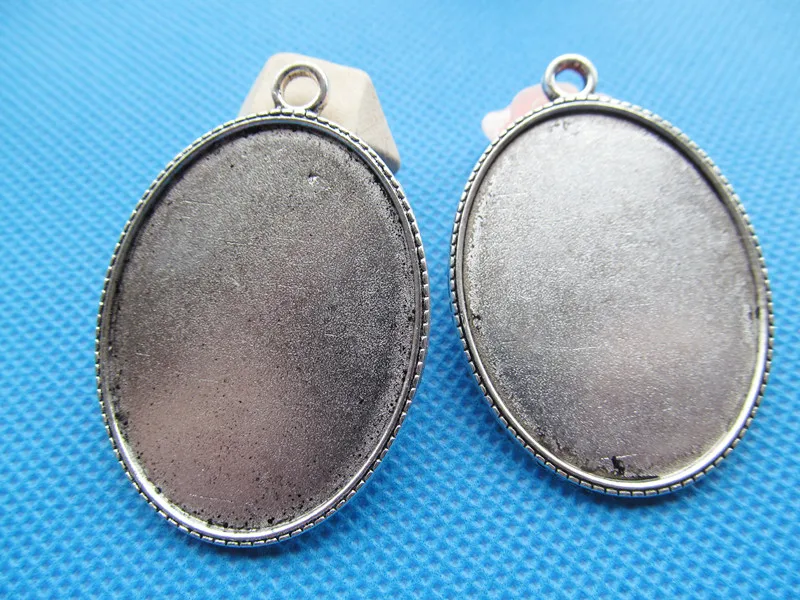 5pcs Antique Silver/Antique Bronze Oval Base Setting Tray Bezel Pendant Charm/Finding,fit 30mmx40mm Cabochon/Cameo,DIY Jewellry
5pcs Antique Silver/Antique Bronze Oval Base Setting Tray Bezel Pendant Charm/Finding,fit 30mmx40mm Cabochon/Cameo,DIY Jewellry