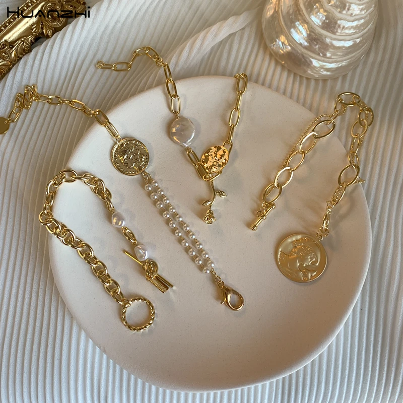 HUANZHI 2019 New Gold Metal Human Face Head Coin Baroque Irregular Pearls Link Chain Bracelets for Women Girl Party Bangle
HUANZHI 2019 New Gold Metal Human Face Head Coin Baroque Irregular Pearls Link Chain Bracelets for Women Girl Party Bangle