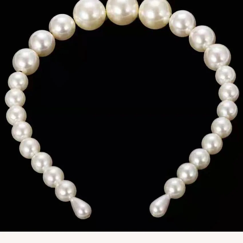 Baroque fashion wild luxury ball personality headband New Korean fashion street beat pearl headband 859
Baroque fashion wild luxury ball personality headband New Korean fashion street beat pearl headband 859