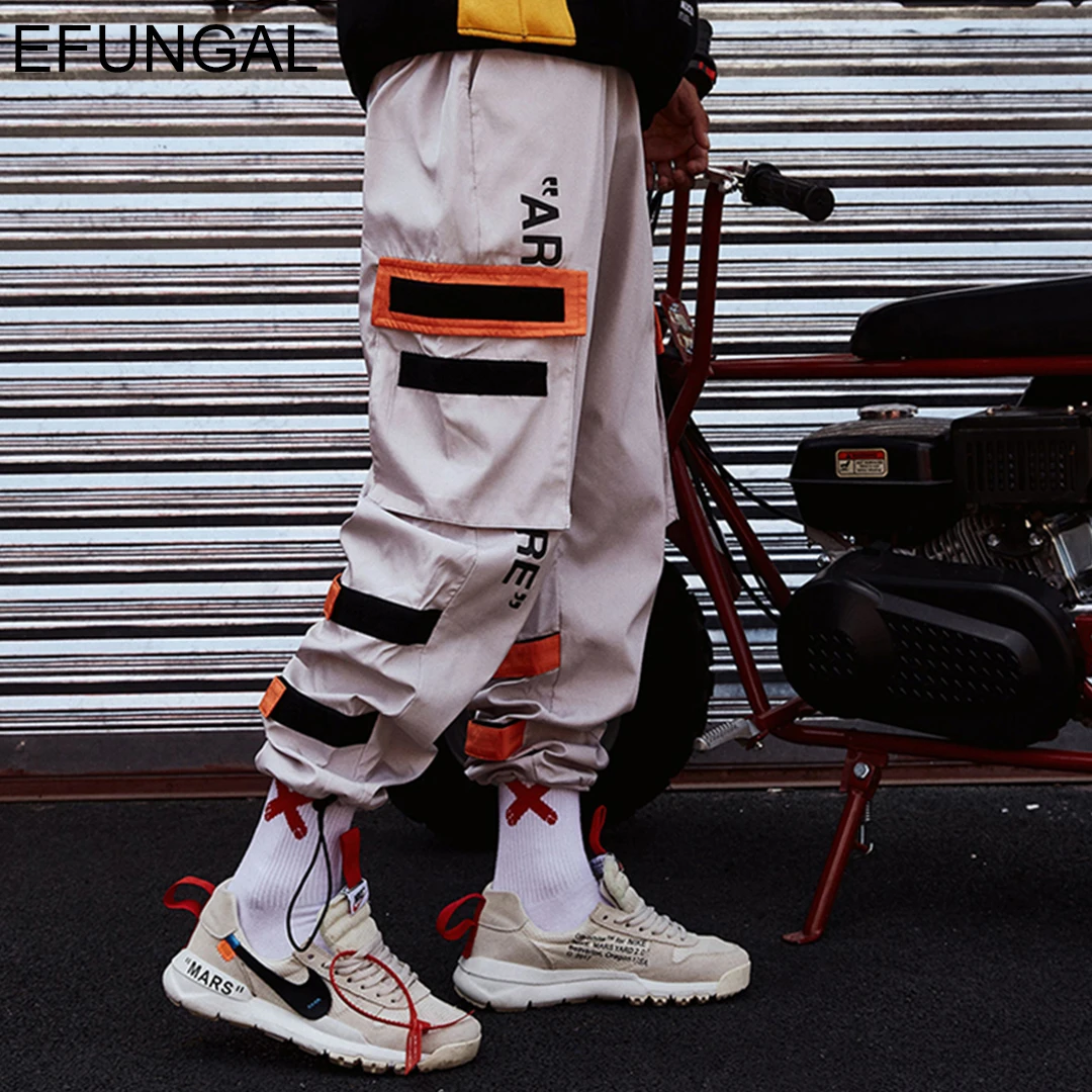 EFUNGAL Men's Side Pockets Cargo Harem Pants 2019 Hip Hop Casual Male Tatical Joggers Trousers Fashion Casual Streetwear Pants
EFUNGAL Men's Side Pockets Cargo Harem Pants 2019 Hip Hop Casual Male Tatical Joggers Trousers Fashion Casual Streetwear Pants