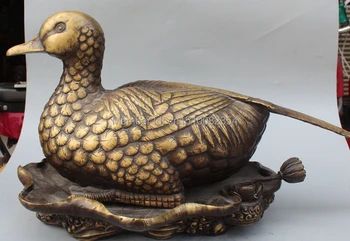 23" Chinese Pure Bronze Fengshui Animal Mandarin Duck On Lotus Flower Sculpture
23" Chinese Pure Bronze Fengshui Animal Mandarin Duck On Lotus Flower Sculpture