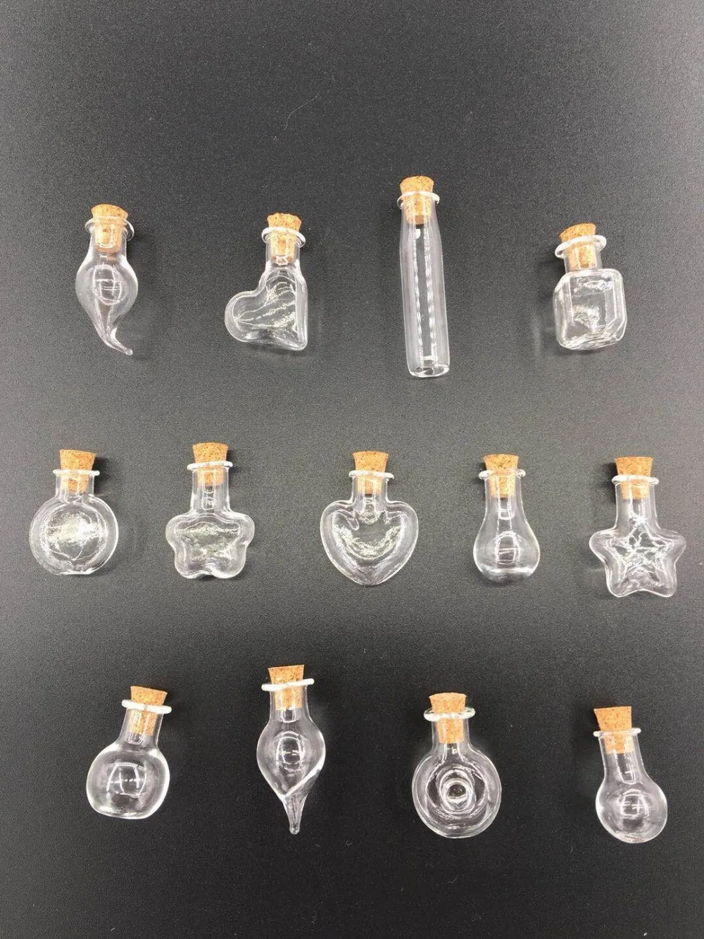 100pcs/lot 1-2ml Mix Shape Mini Glass Bottles Souvenir Charm Glass Bottle with Cork DIY Hanging Rope Wish Pendants Drift Bottle
100pcs/lot 1-2ml Mix Shape Mini Glass Bottles Souvenir Charm Glass Bottle with Cork DIY Hanging Rope Wish Pendants Drift Bottle