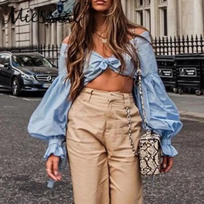 Miessial Off shoulder bandage sexy blouse shirt Women lantern sleeve blue crop top Winter streetwear v neck elegant top 2019 new
Miessial Off shoulder bandage sexy blouse shirt Women lantern sleeve blue crop top Winter streetwear v neck elegant top 2019 new