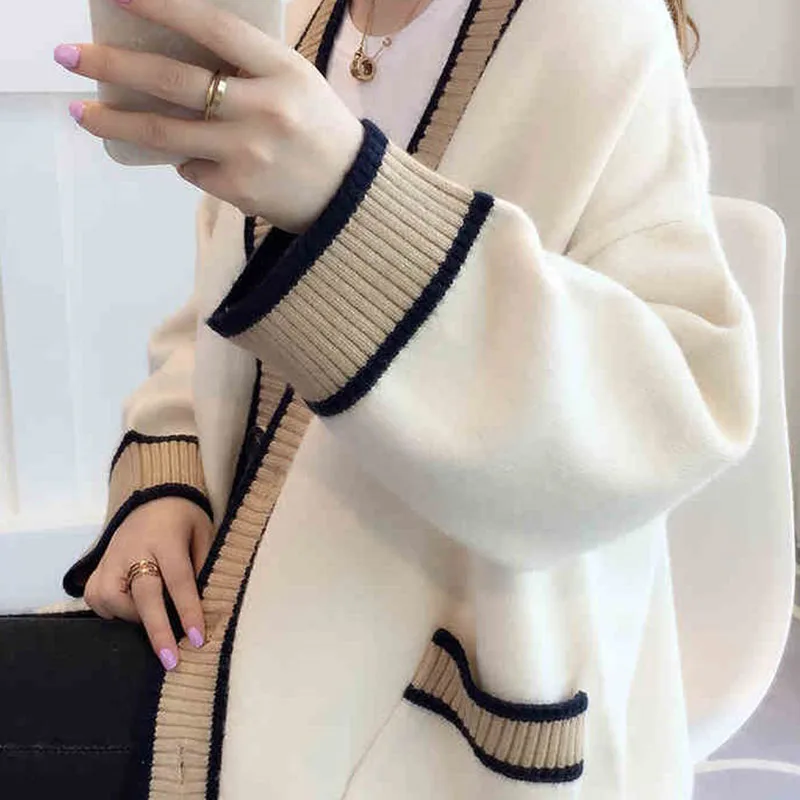 Women's Sweater 2019 Spring and Winter New Sweater Loose Long Section of the Tide V-neck Fashion College Wind B22
Women's Sweater 2019 Spring and Winter New Sweater Loose Long Section of the Tide V-neck Fashion College Wind B22