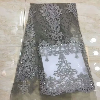 Nigerian lace fabrics with sequins 5yard/lot fashion sequins fabric high quality grey tulle lace for wedding dresses xc65-1184
Nigerian lace fabrics with sequins 5yard/lot fashion sequins fabric high quality grey tulle lace for wedding dresses xc65-1184