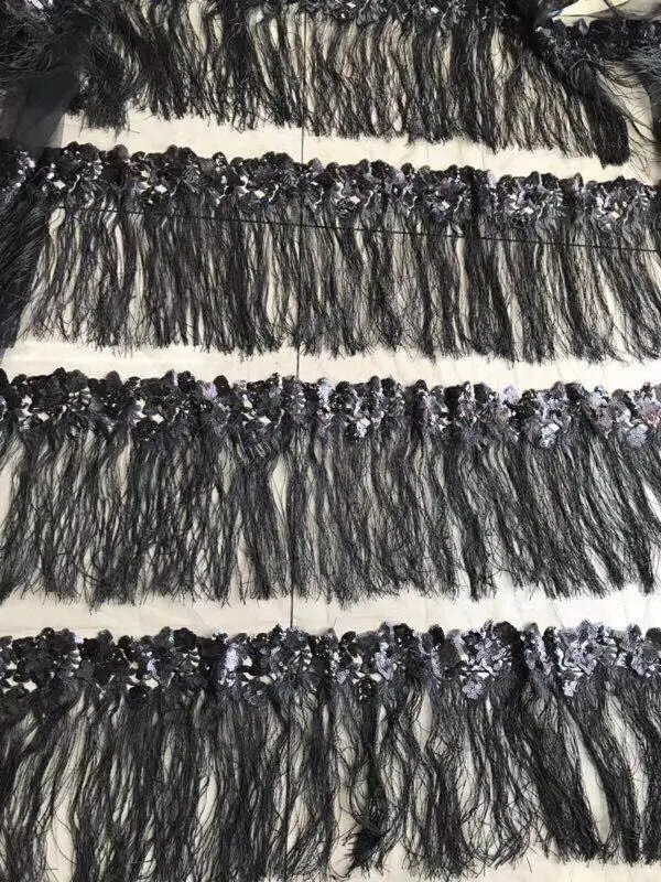 Fashion fringe tassel Embroidered tulle mesh fabric beautiful Black sequins lace fabric for party evening dress
Fashion fringe tassel Embroidered tulle mesh fabric beautiful Black sequins lace fabric for party evening dress