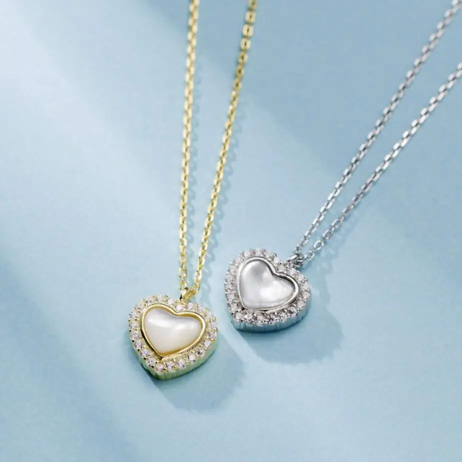 HRina Sweet S925 Sterling Sliver Gold Plated Full Zircon Heart Shell Pendant Necklace Choker Extended Chains For Women Jewelry
HRina Sweet S925 Sterling Sliver Gold Plated Full Zircon Heart Shell Pendant Necklace Choker Extended Chains For Women Jewelry
