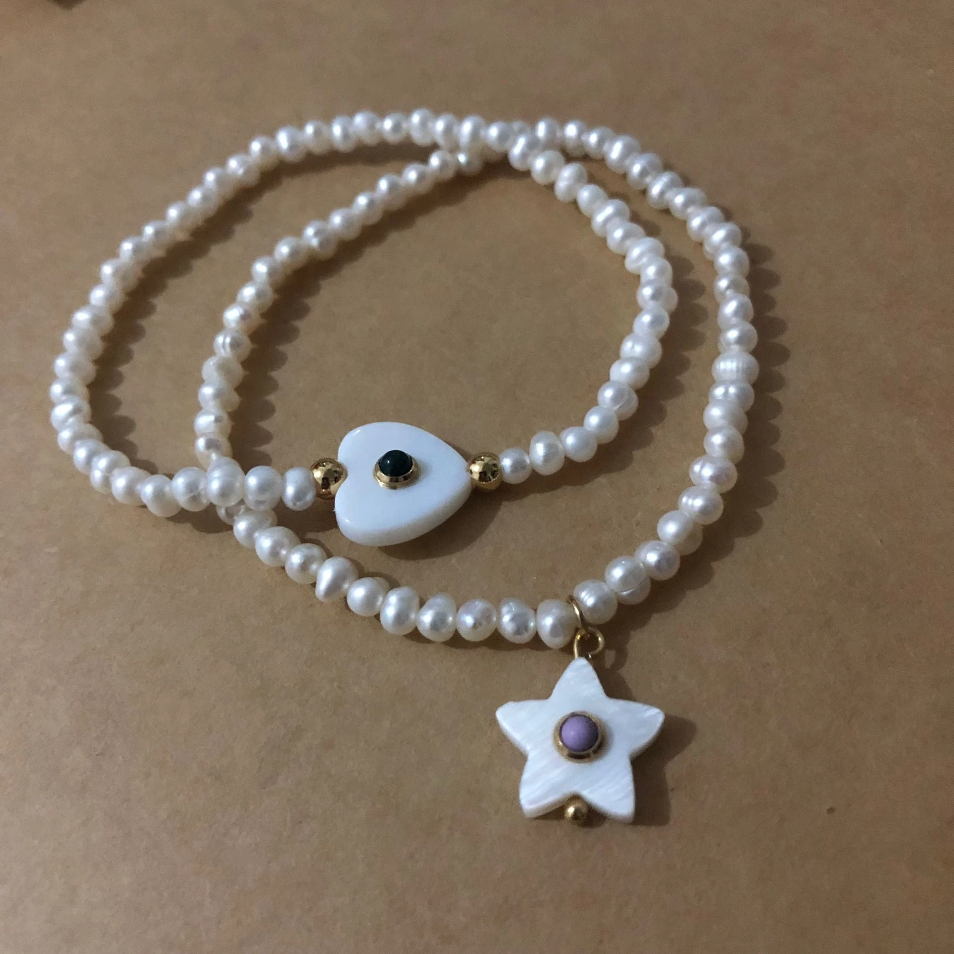 Few on stock Fashion Spain style natural white pearls with shell heart star gold charms bears beaded bracelet Pulsera osos
Few on stock Fashion Spain style natural white pearls with shell heart star gold charms bears beaded bracelet Pulsera osos