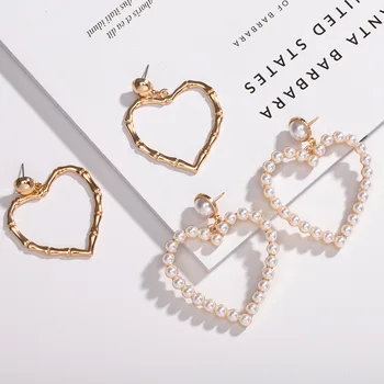 New Arrival Simulated Pearls Drop Earrings Gold Color Hollow Hearts Geometric Earrings For Women 2019 Fashion Weddings Jewelry 
New Arrival Simulated Pearls Drop Earrings Gold Color Hollow Hearts Geometric Earrings For Women 2019 Fashion Weddings Jewelry