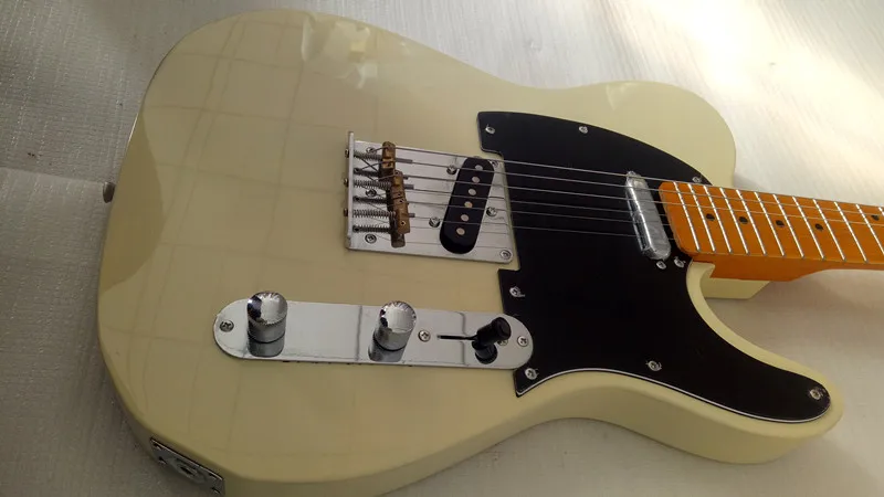 Factory Custom high quality TL electric guitar Retro white In-kind Shooting neck faint yellow free delivery
Factory Custom high quality TL electric guitar Retro white In-kind Shooting neck faint yellow free delivery