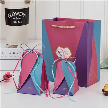 AVEBIEN European Wedding Supplies Creative Candy Box with Ribbon Chocolate Paper Gift Box Wedding Favors and Gifts Box Packaging 
AVEBIEN European Wedding Supplies Creative Candy Box with Ribbon Chocolate Paper Gift Box Wedding Favors and Gifts Box Packaging