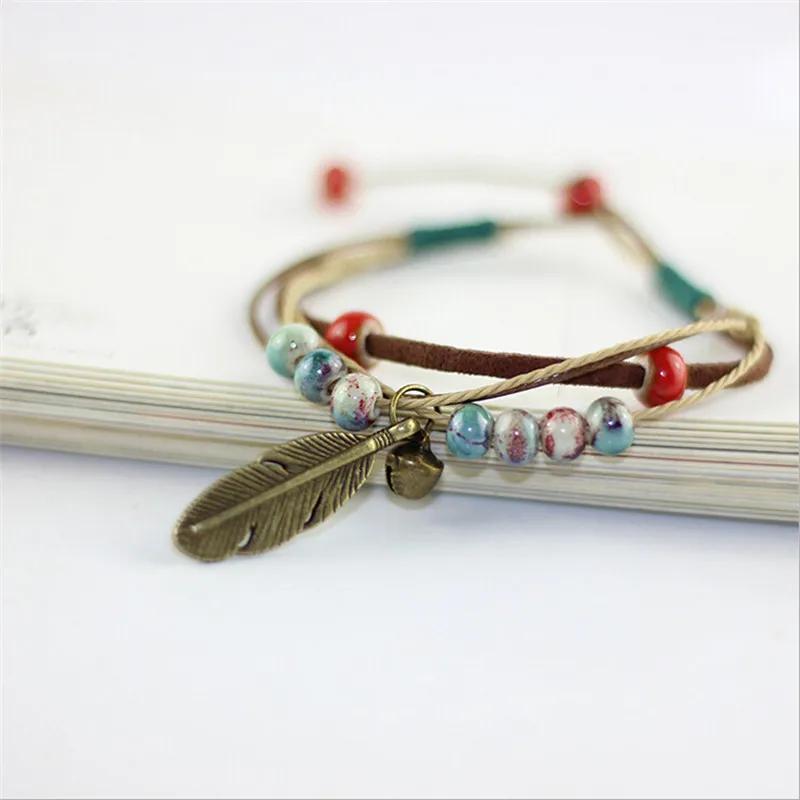 new arrival handmade feather ceramic bracelet for women multi layer weave bracelets bell charm bracelets fashion jewelry gifts
new arrival handmade feather ceramic bracelet for women multi layer weave bracelets bell charm bracelets fashion jewelry gifts
