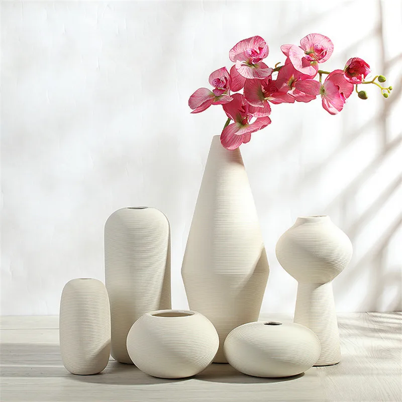 European white porcelain ceramic flower vase decoration simple modern Flower inserter three-piece home decorations accessories
European white porcelain ceramic flower vase decoration simple modern Flower inserter three-piece home decorations accessories