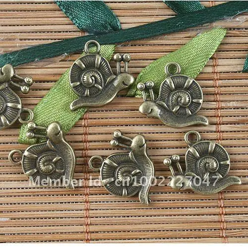 26pcs antiqued bronze two sides snail pendant G1572
26pcs antiqued bronze two sides snail pendant G1572