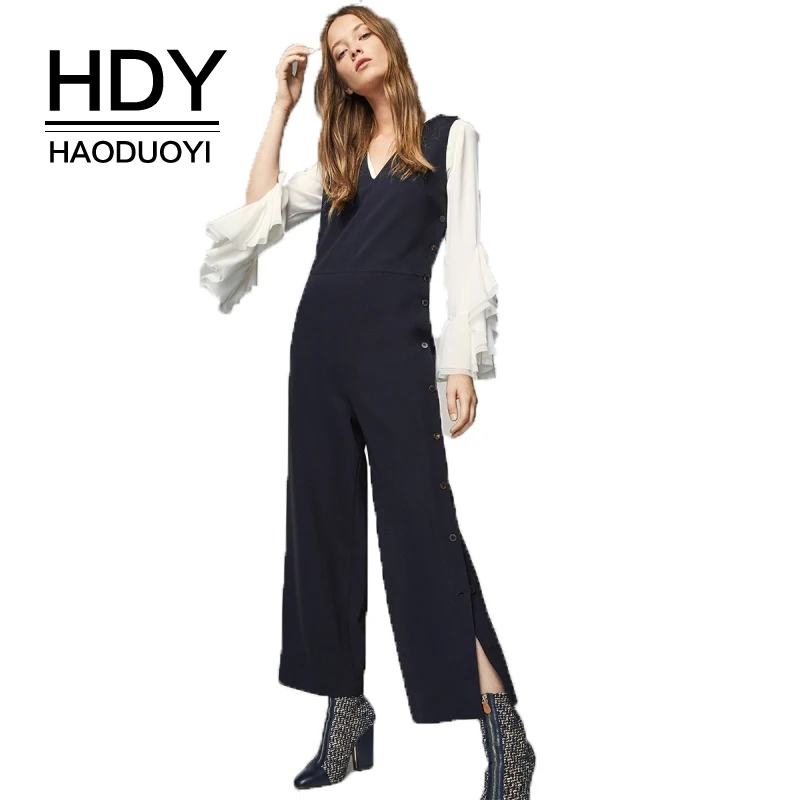 HDY Haoduoyi 2019 Casual Solid Dark Blue Women Jumpsuits V-Neck Loose Leg Buttons Side Split Mid-Rise Female Elegant Rompers
HDY Haoduoyi 2019 Casual Solid Dark Blue Women Jumpsuits V-Neck Loose Leg Buttons Side Split Mid-Rise Female Elegant Rompers