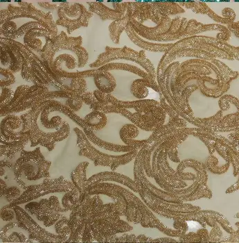 Champaign gold high quality french tulle lace fabric African sequins net lace glitter fabric for woman wedding dress
Champaign gold high quality french tulle lace fabric African sequins net lace glitter fabric for woman wedding dress